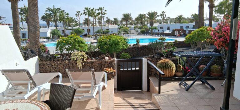 View of the pool and green areas in Casas del Sol, Tenerife.
